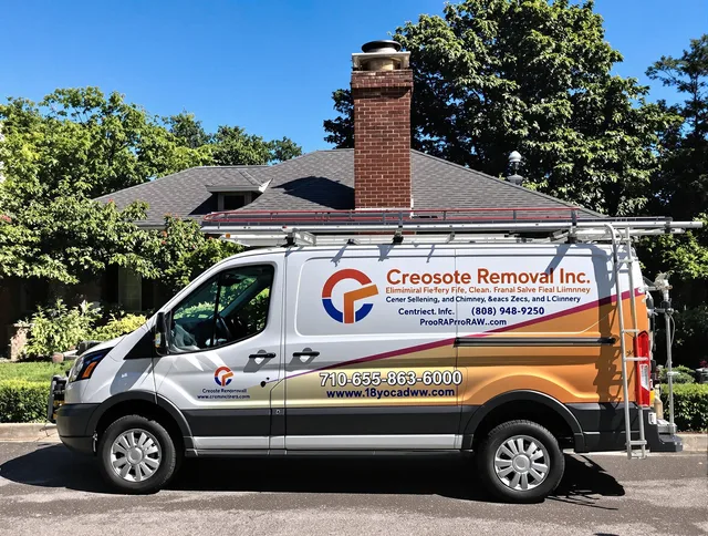 West Warwick Chimney Sweep technician removing creosote safely in West Warwick, RI